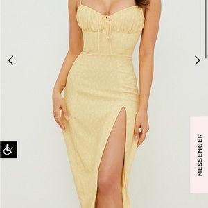 CARINA 
YELLOW FLORAL BUSTIER MIDI DRESS